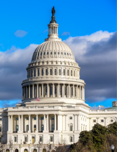 photo of Capitol Hill with sky and clouds in background