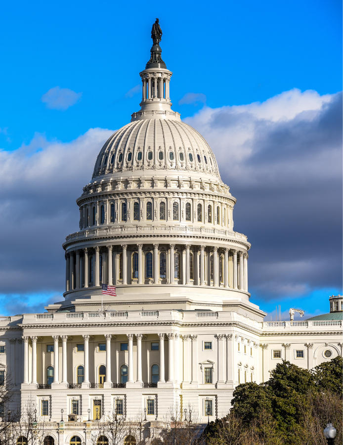 photo of Capitol Hill with sky and clouds in background