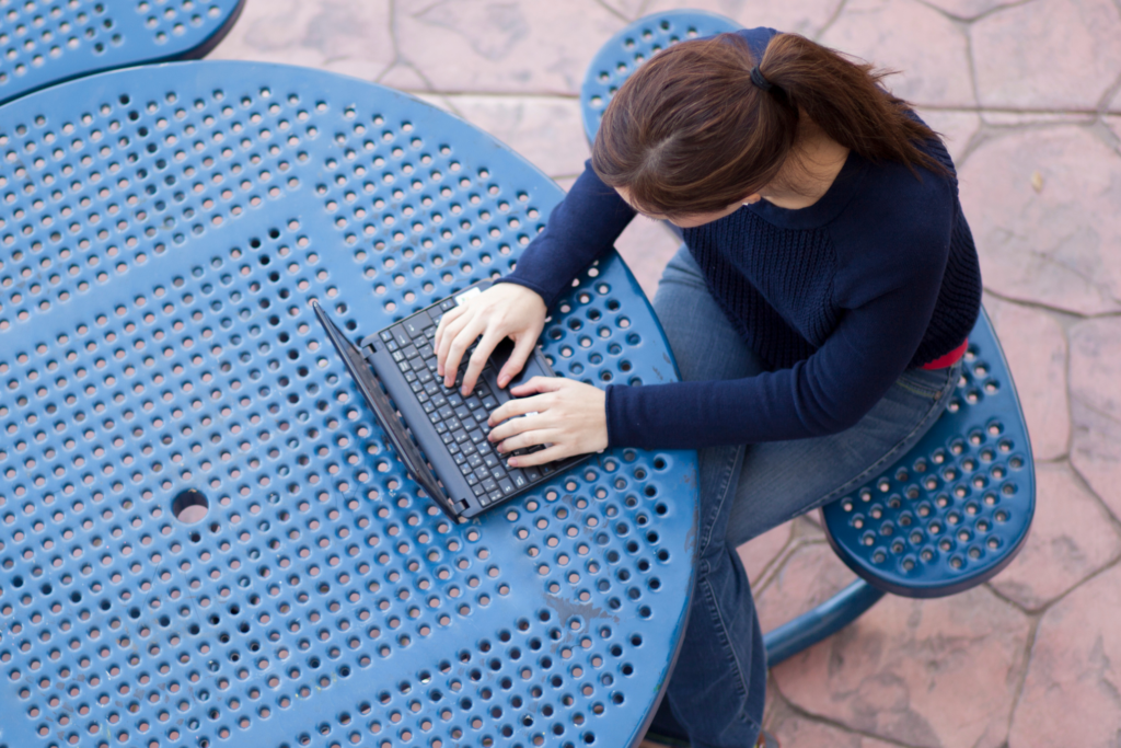 aerial view of college student working on computer