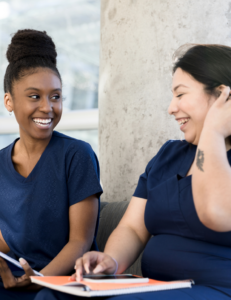 CNA students laughing while studying