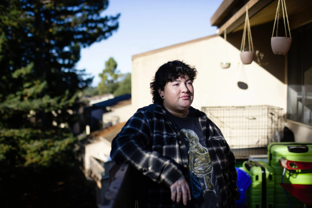 Photo of Elizabeth Cornwall on the deck outside her home