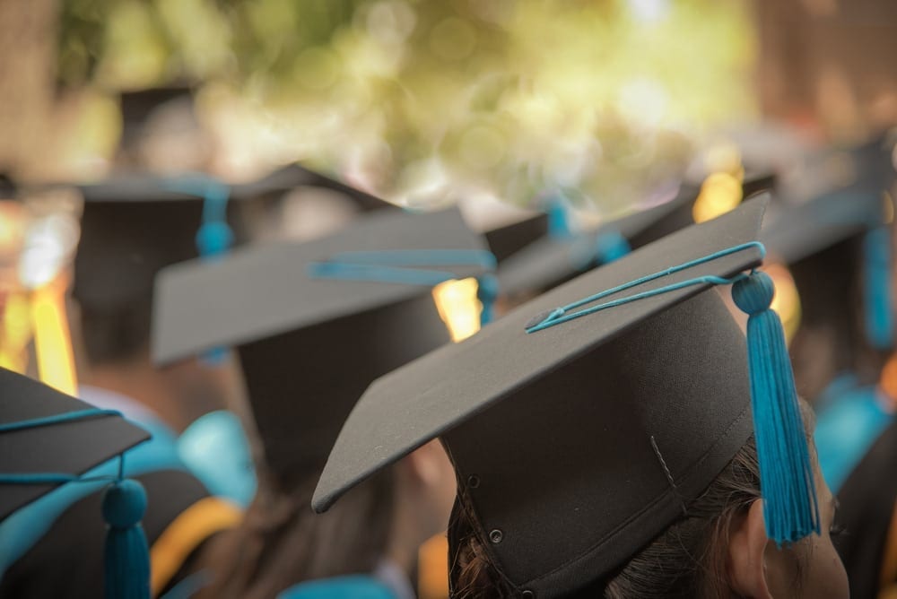 Series of Graduation Caps with blue tassels